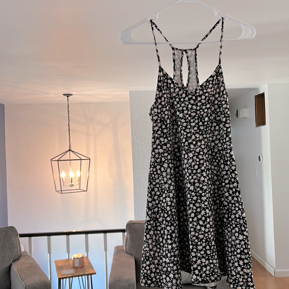 Cute black daisy dress.